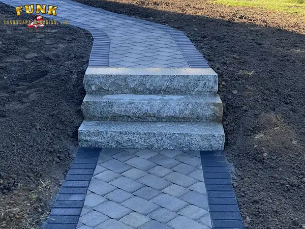Finished paver walkway with granite steps from above