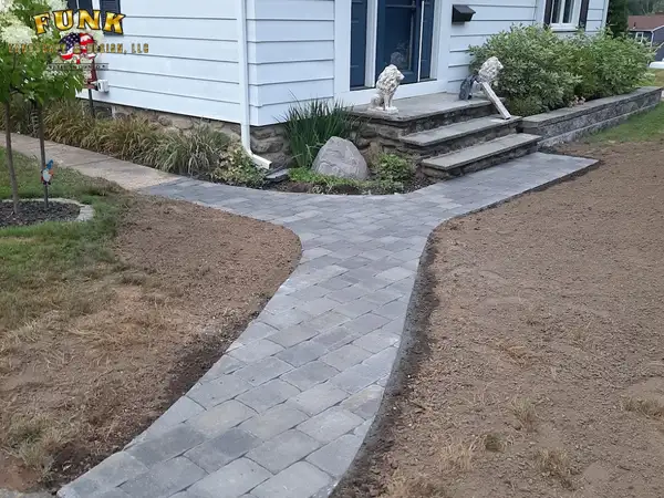 Completed paver walkway leading to the granite front steps