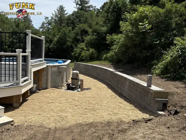 Finished stone front steps with paver landing at the entry