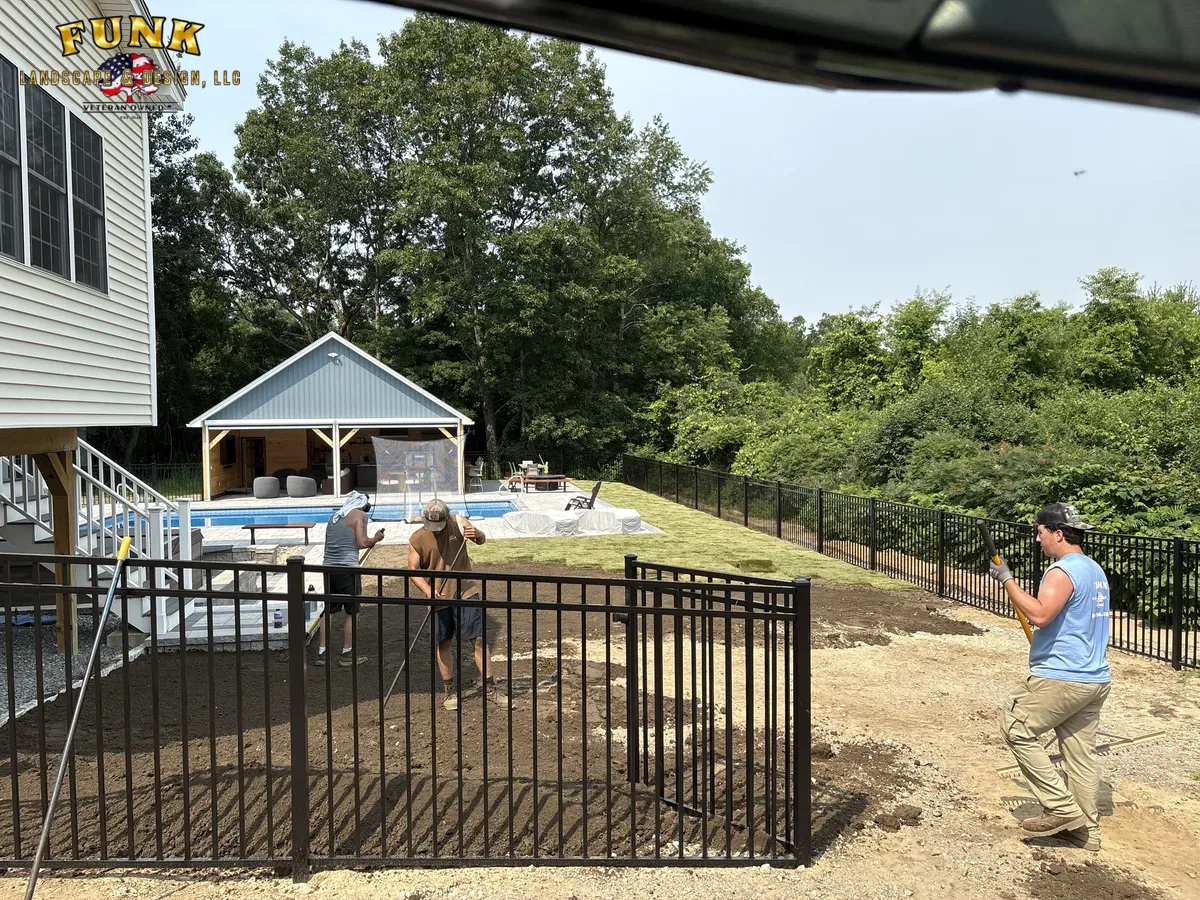 Lawn resodding around a residential pool in Grafton, Massachusetts, by Funk Landscape & Design