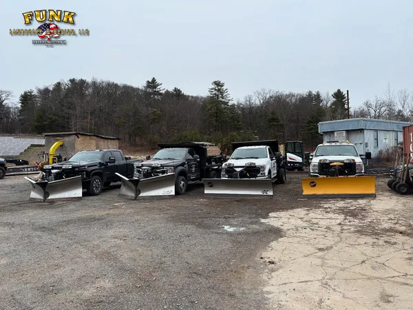Commercial snow plowing in Worcester, MA by Funk Landscape & Design